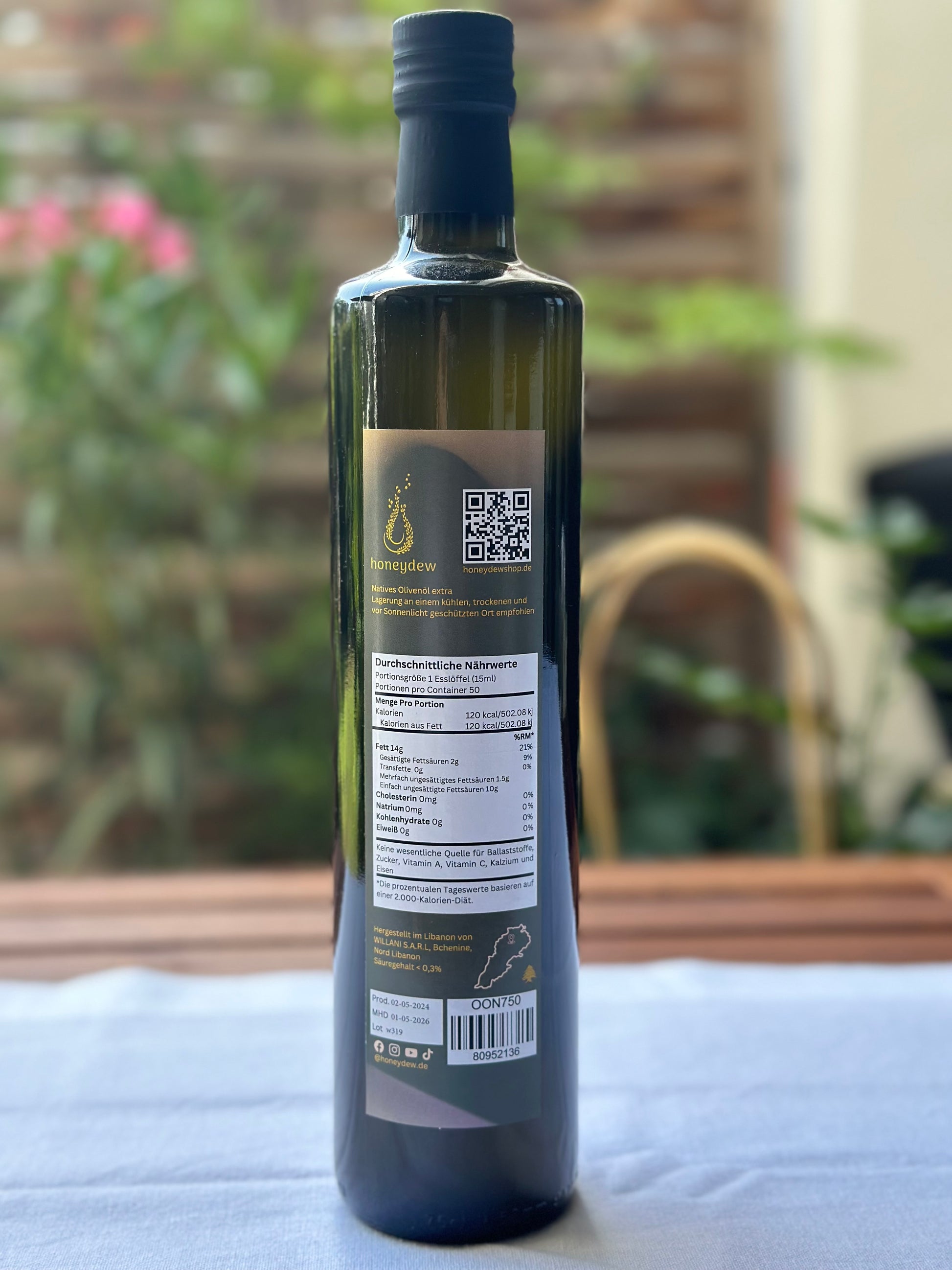 Die Rückseite einer Flasche libanesisches natives Olivenöl extra von "honeydew" zeigt detaillierte Nährwertangaben